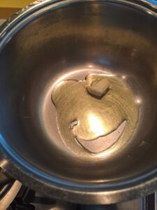 Olivenöl und Butter erhitzen