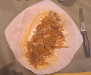 Gemüse-Fleisch-Gemisch auf den Tortilla-Fladen