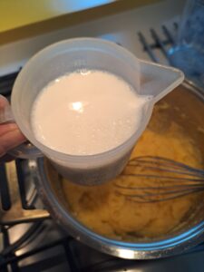 Milch einrühren